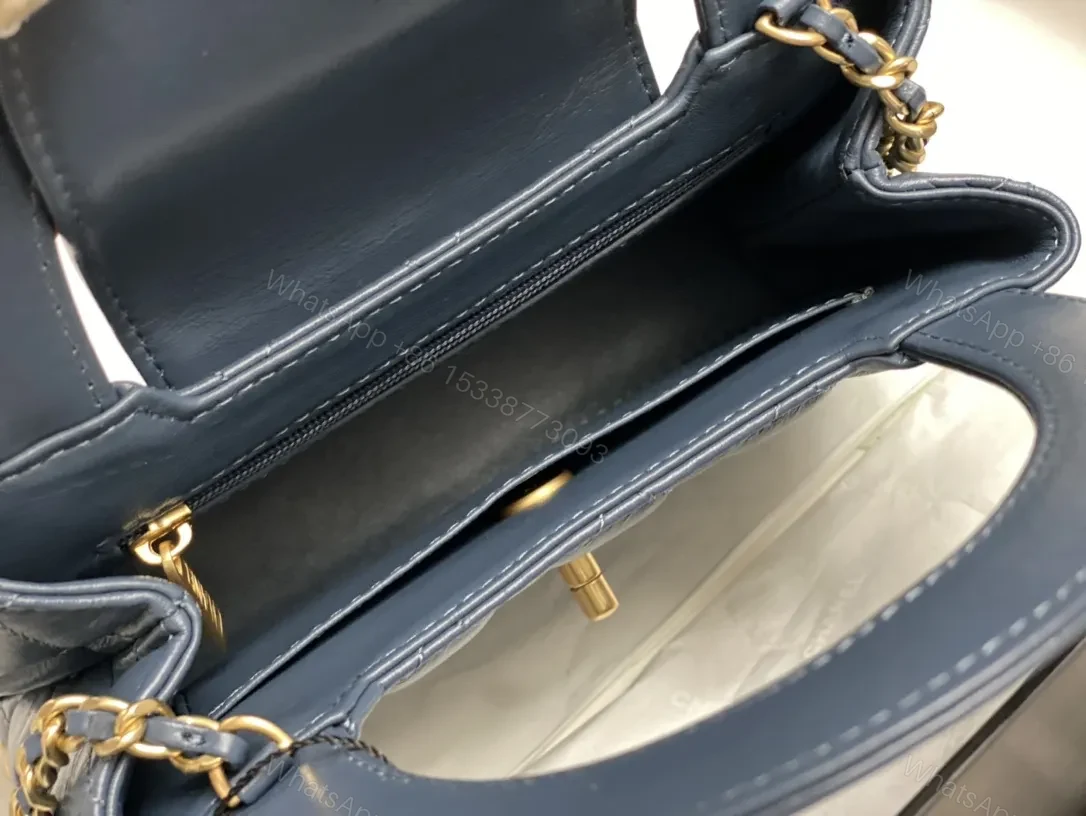 View 5 of Blue Quilted Mini Bag: Structured Luxury, Gold Hardware