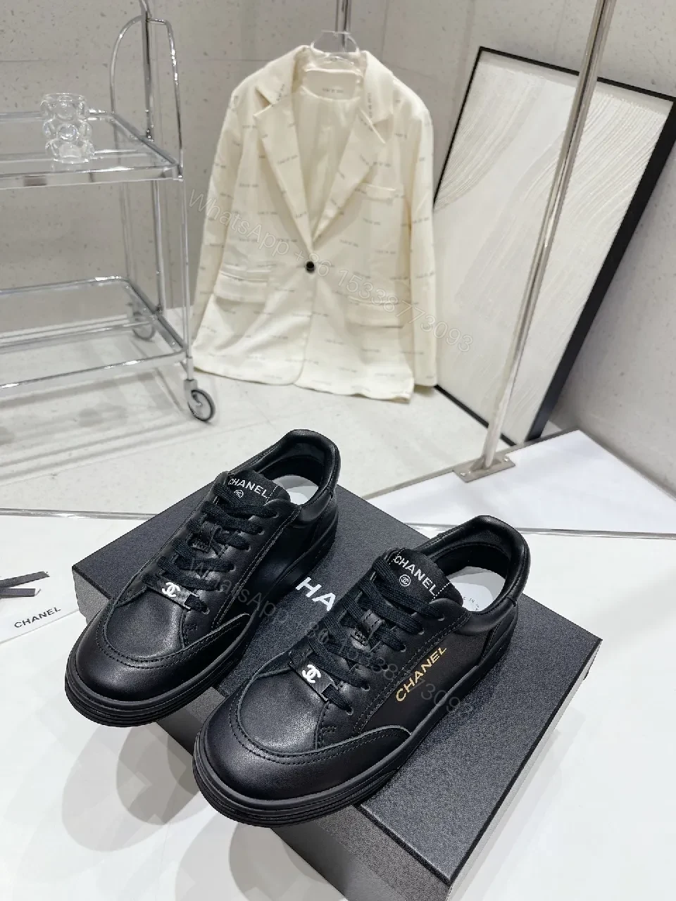 Black Leather Sneakers: Subtle Branding, All-Day Comfort — view 1