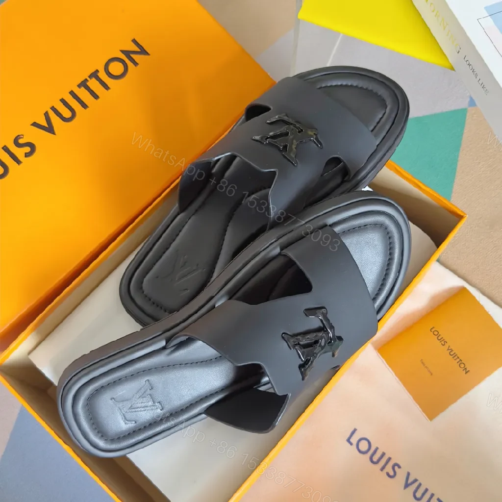 View 2 of Minimalist Black Leather Slides with Signature Emblem