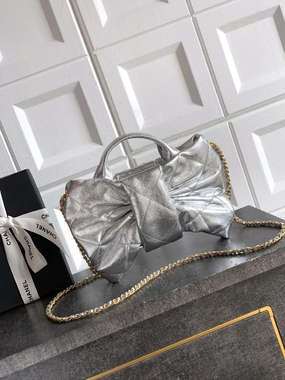 View 7 of Shimmer Quilted Metallic Handbag with Gold Hardware