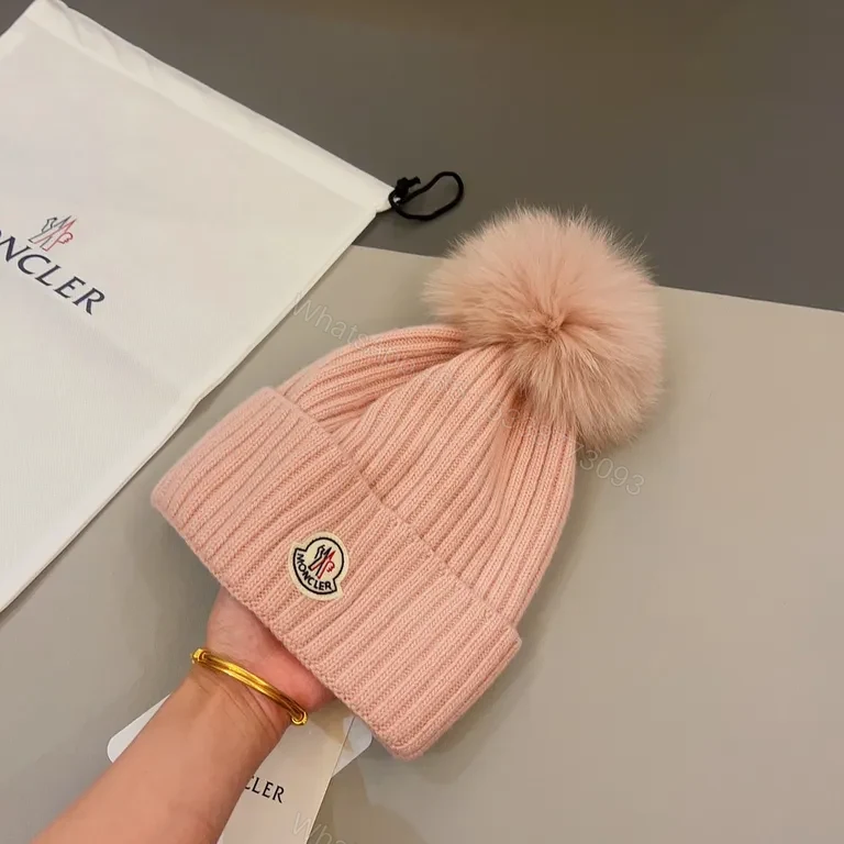 View 7 of Chic Pink Moncler Beanie with Pom-Pomâ€”All-Day Warmth