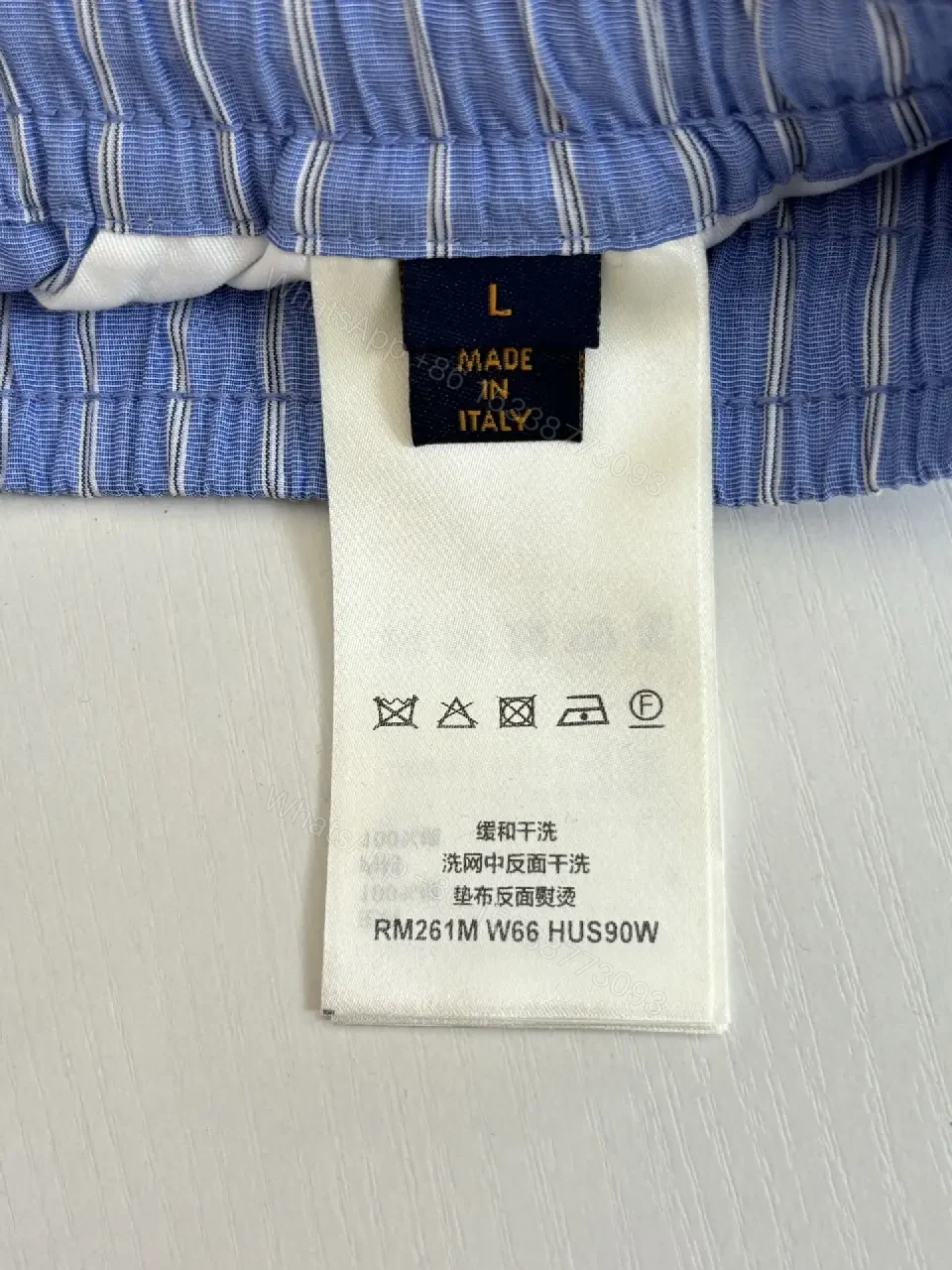 View 6 of Blue Striped Lightweight Drawstring Shorts - Subtle Embossed Logo Luxury