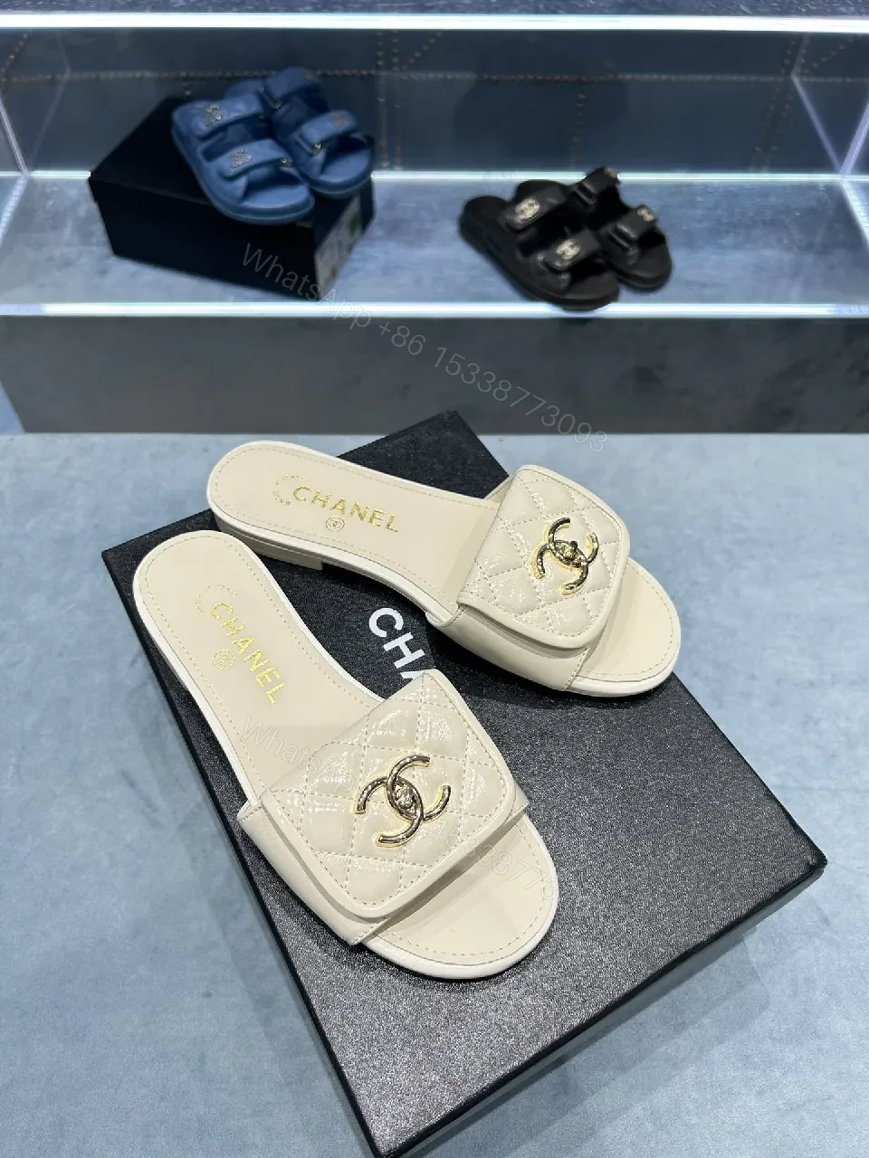 View 3 of Beige Quilted Strap Slide Sandals with Gold Double-C Logo