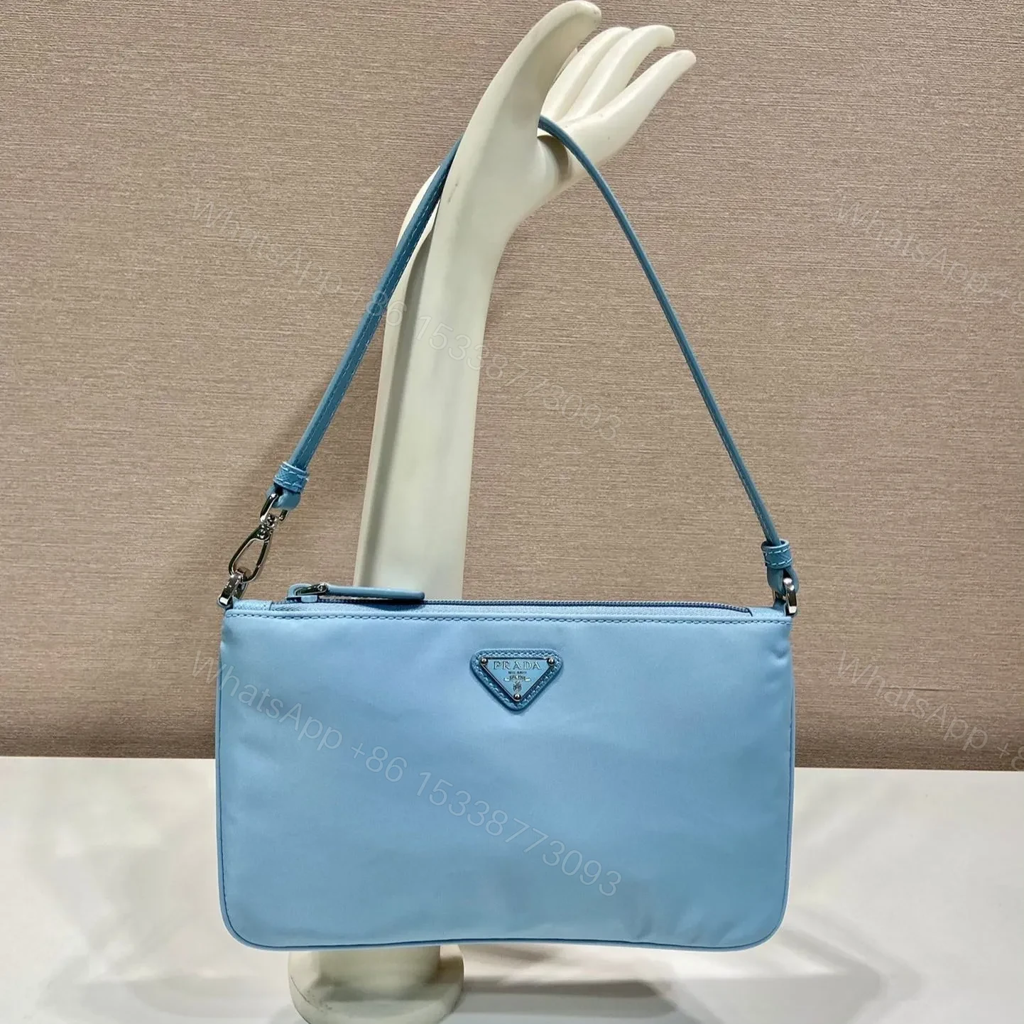 SHOULDER BAG 24 WITH TRIANGLE LOGO IN SKY BLUE RE-NYLON FABRIC — view 1