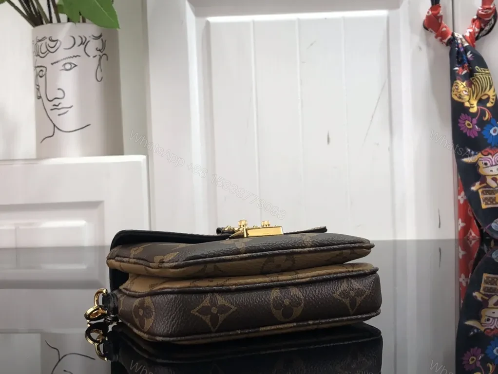 View 6 of Gold-Coated LV Monogram Crossbody Bag - Compact Luxury