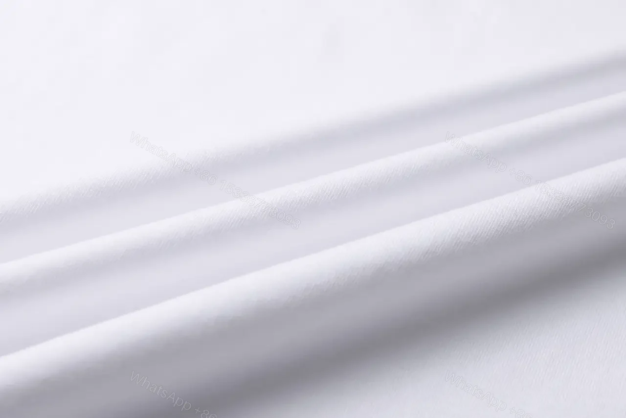 View 3 of White Cotton Moncler Tee: Subtle Luxury Everyday Comfort