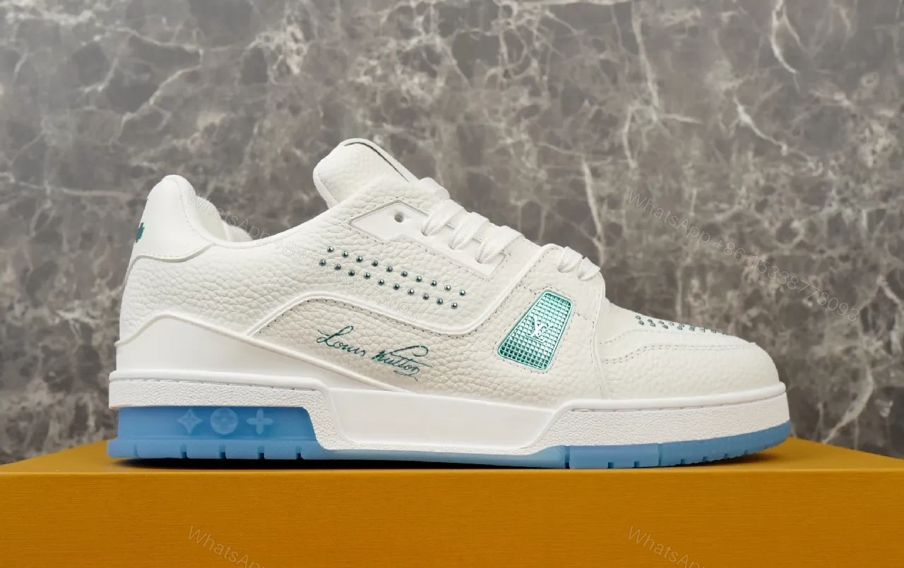 View 8 of White Leather Luxury Sneakers with Subtle LV Accents