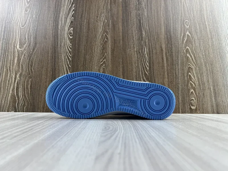 View 3 of White & Blue Minimalist Leather Sneaker â€“ Low-Top Comfort