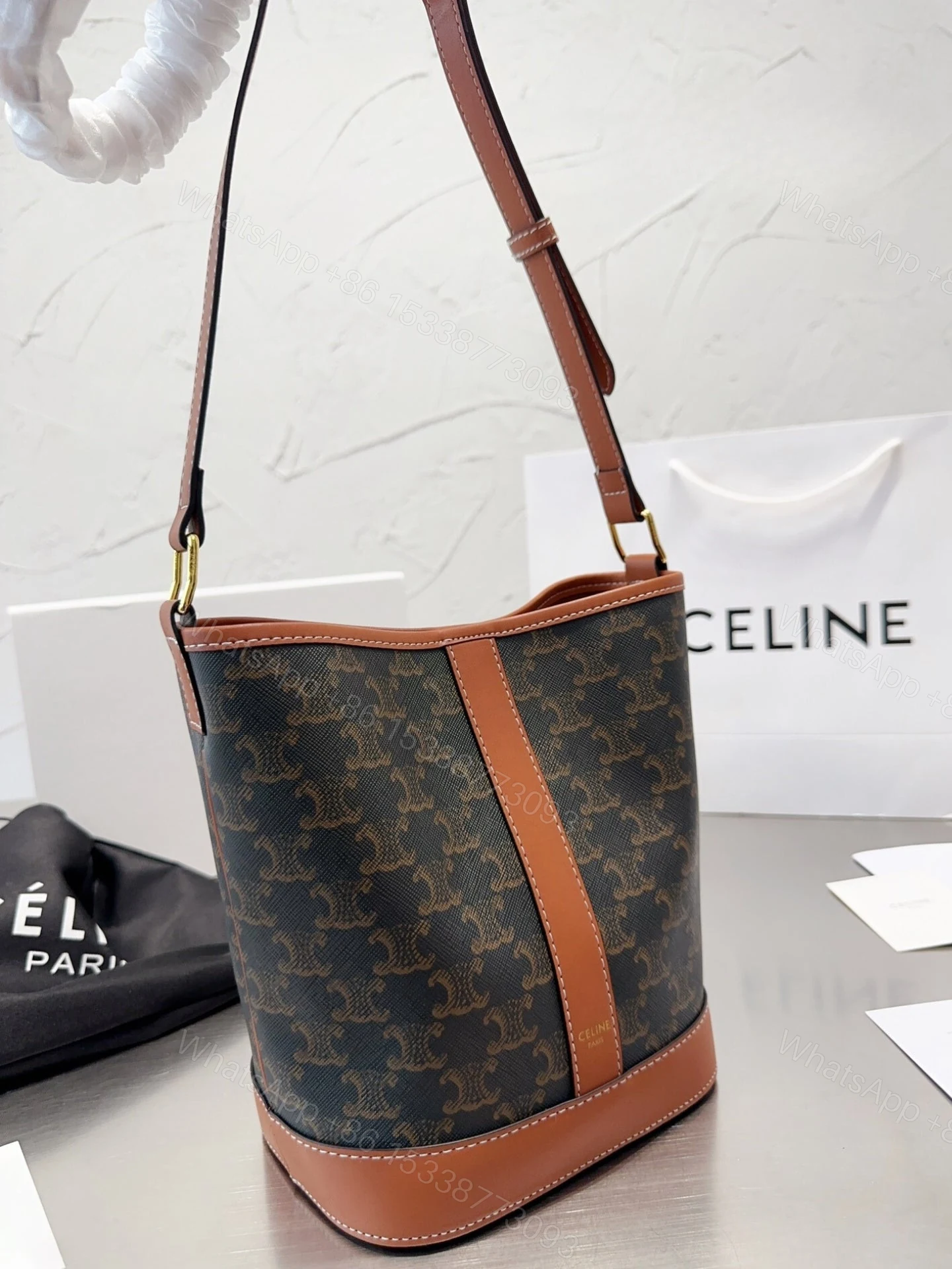 View 6 of CELINE SMALL BUCKET IN TRIOMPHE CANVAS AND CALFSKIN TAN 20CM 191442CAS04LU