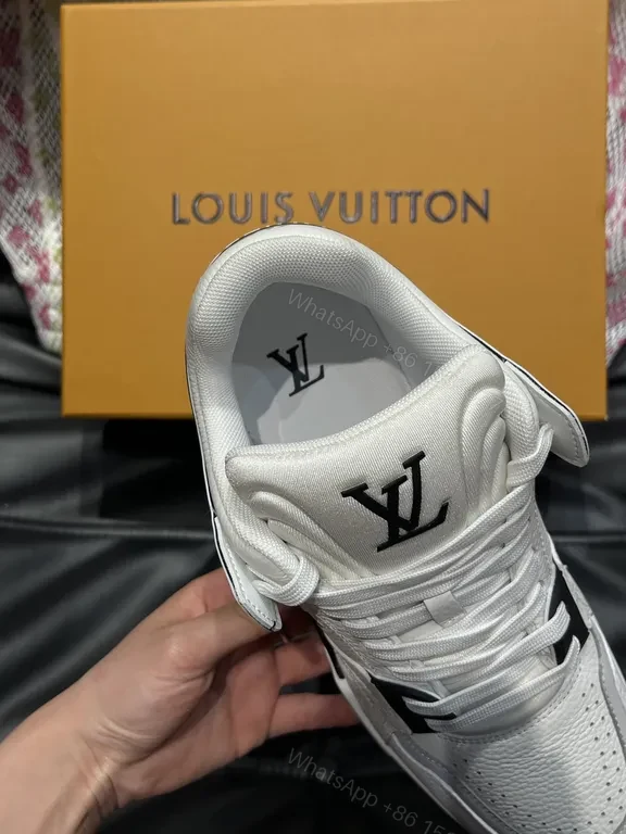 View 6 of White Leather High-Top Sneakers with LV Branding and Visible Hardware