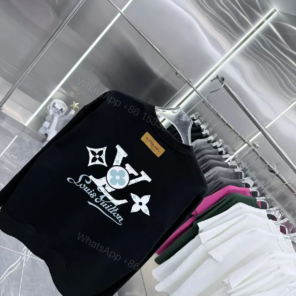 View 7 of Minimalist Black Crewneck with Subtle LV-Accent - Luxury Staple