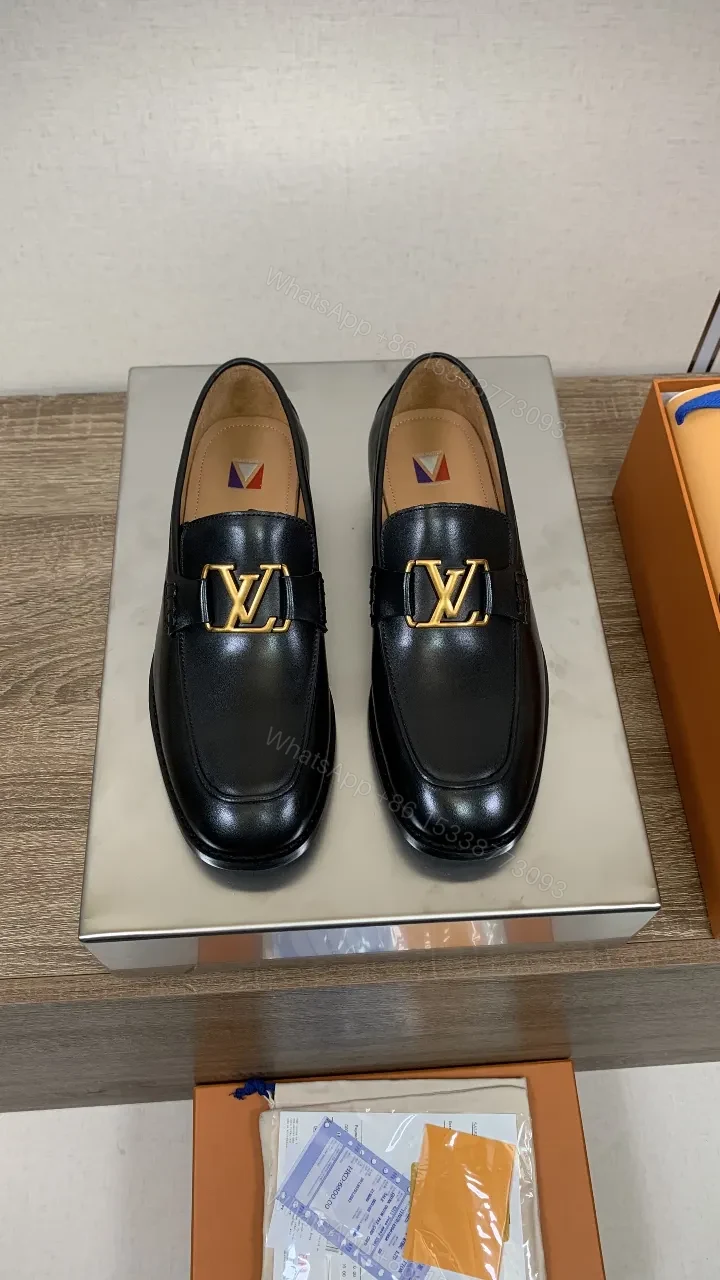 View 9 of Chic Black Leather Penny Loafers with Gold Hardware