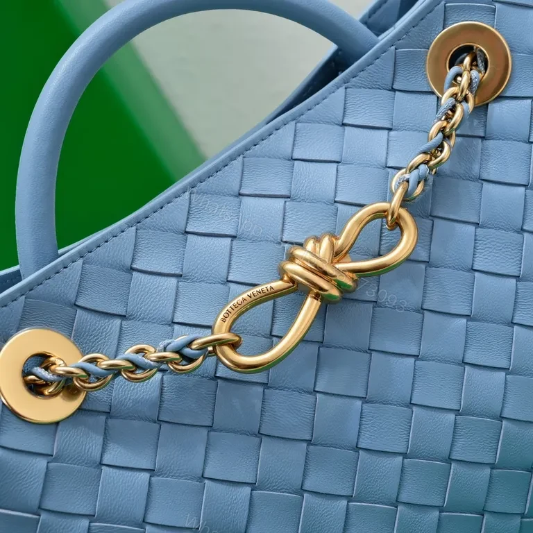 View 2 of Blue Woven Handbag: Premium Vegan Textile, Gold Hardware, Structured Silhouette