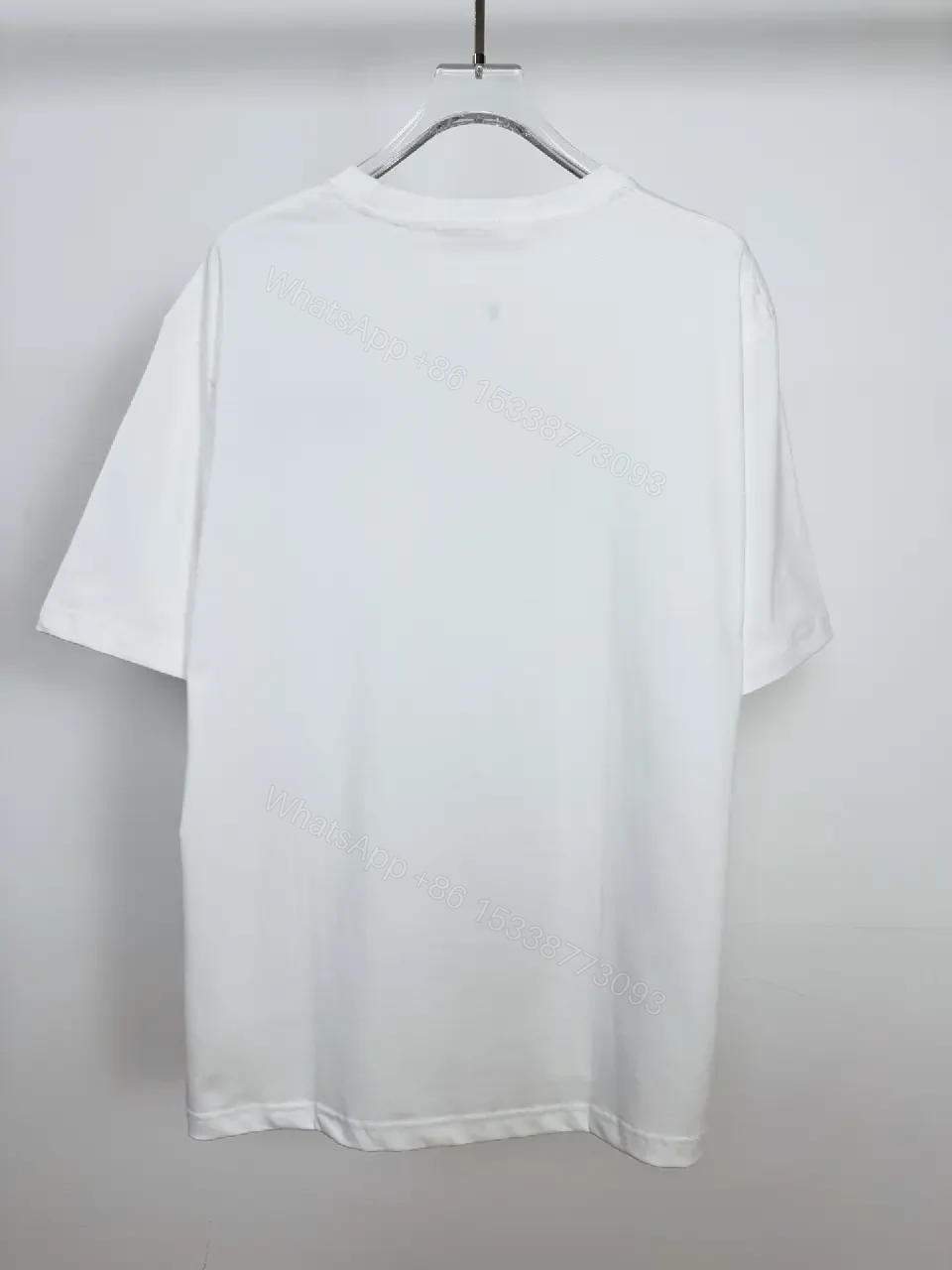 View 7 of Minimalist White Cotton Tee with Bold Pocket, Everyday Luxury Top