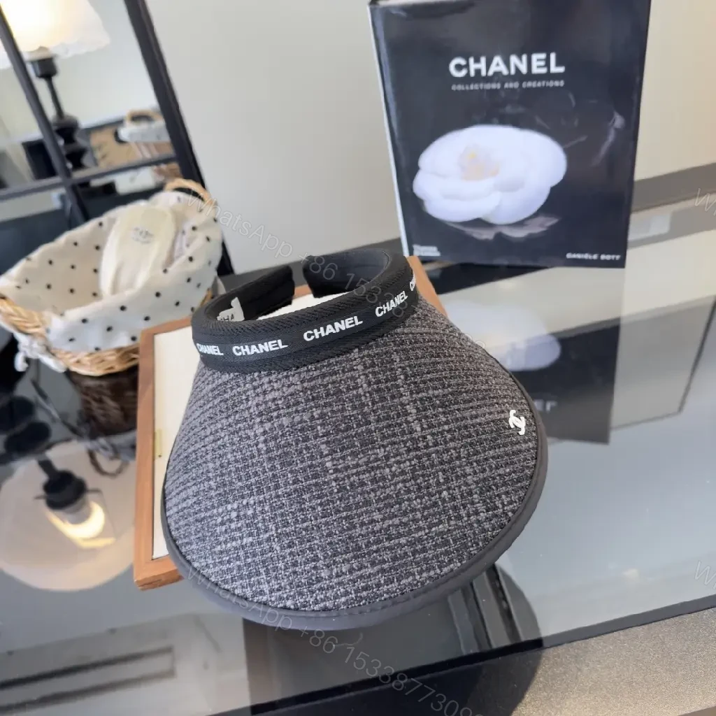 View 10 of Dark Gray Tweed Visor Cap with White Chanel Logo and Silver Emblem