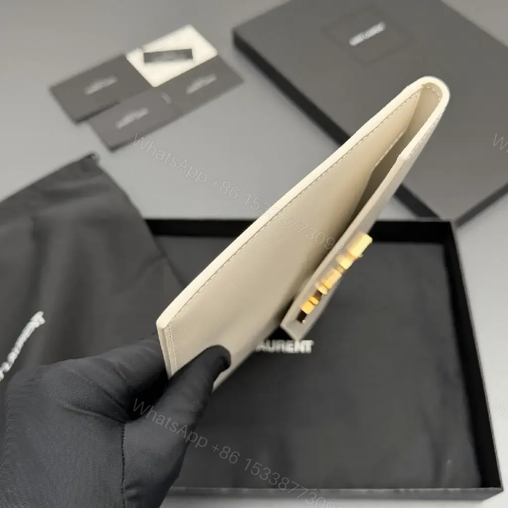 View 8 of Ivory Leather Envelope Clutch with Gold-Tone Hardware, Minimalist Chic