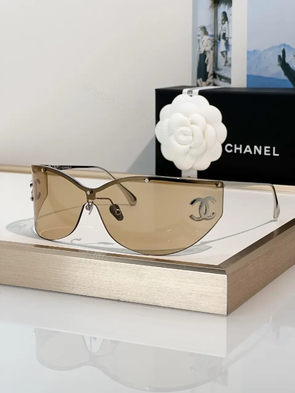 View 9 of Lux Black Gold Shield Sunglasses with Chanel Logo