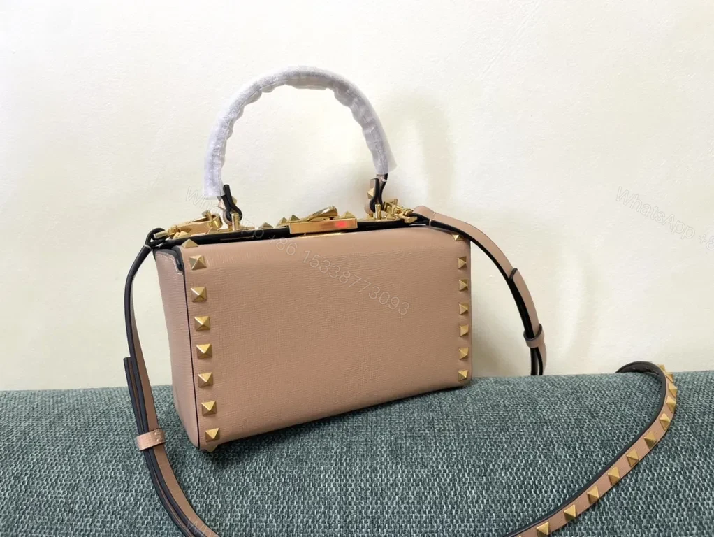 View 3 of Chic Pink Rockstud Mini Bag: Compact Luxury Handbag
