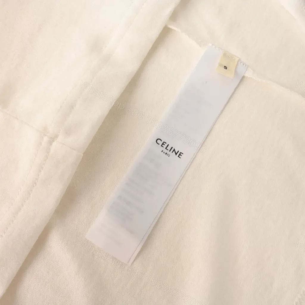View 7 of Minimalist White Cotton Tee — Bold Celine Graphic, Premium-essence