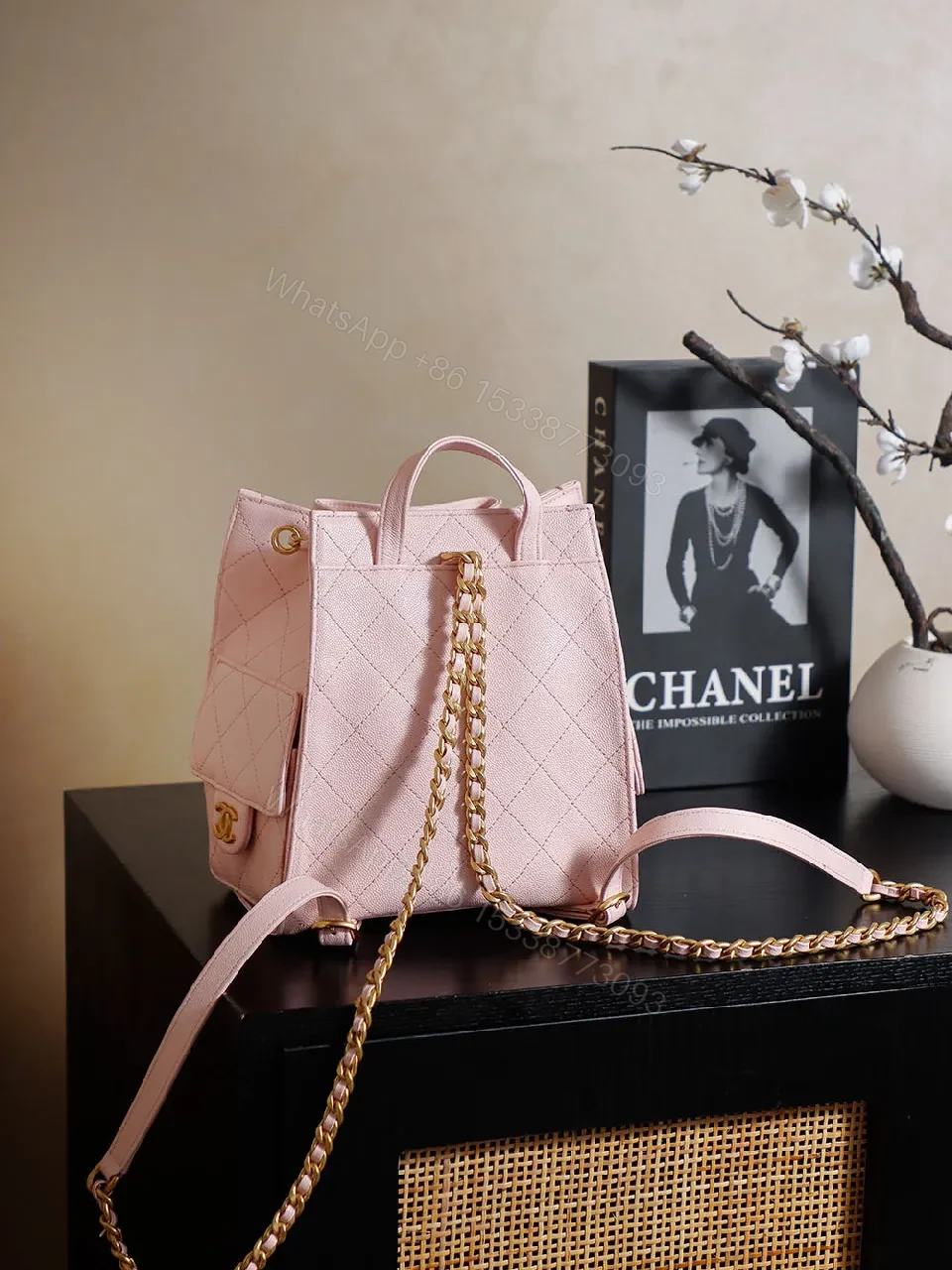 View 2 of Soft Pink Quilted Bucket Bag with Gold Charm, Faux-Leather Bag