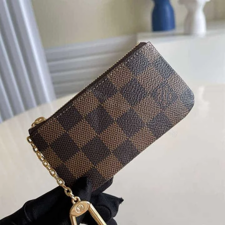 View 2 of M62650 Louis Vuitton Key Pouch Damier Ebene Coated Canvas In Brown – RRG055