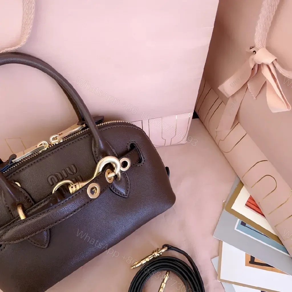 View 2 of Compact Pebbled Leather Satchel with Gold Hardware