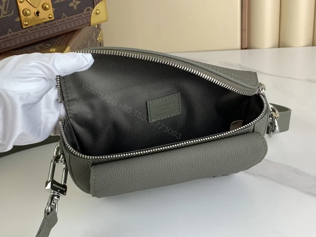 View 4 of Quiet Luxe Compact Crossbody: Pebbled Leather, LV Logo, Gold Hardware