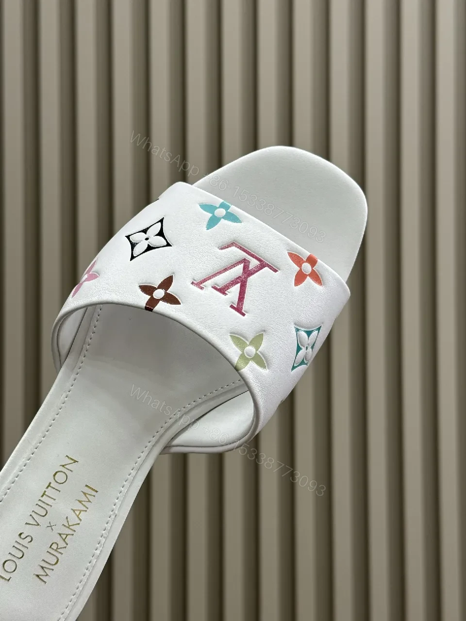 View 5 of White Leather Slides with Multicolor Monogram Detailing - Modern Luxury Comfort