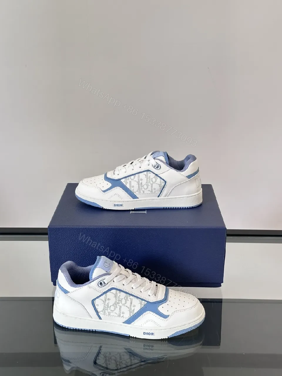 View 7 of White & Sky Blue Leather High-Tops with Subtle Monogram Texture
