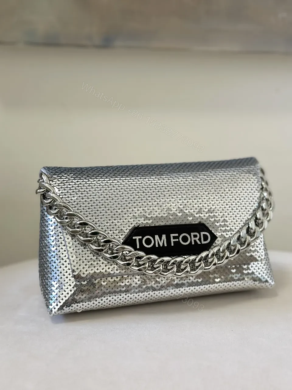 View 5 of Chic Metallic Crossbody Clutch: Bold Chain Luxury