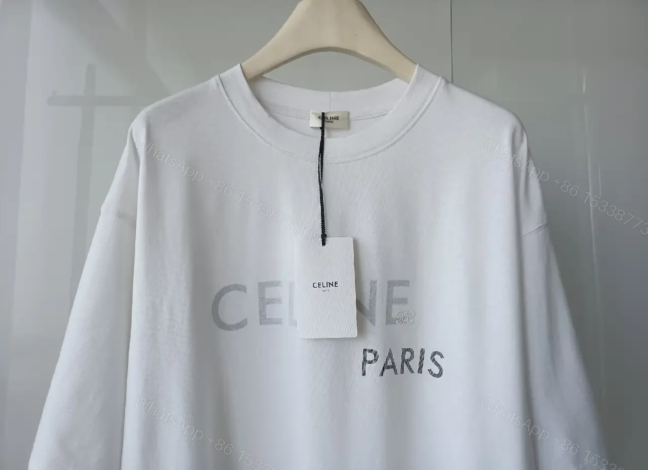 View 9 of Minimalist White Cotton Tee - Relaxed Luxe Comfort