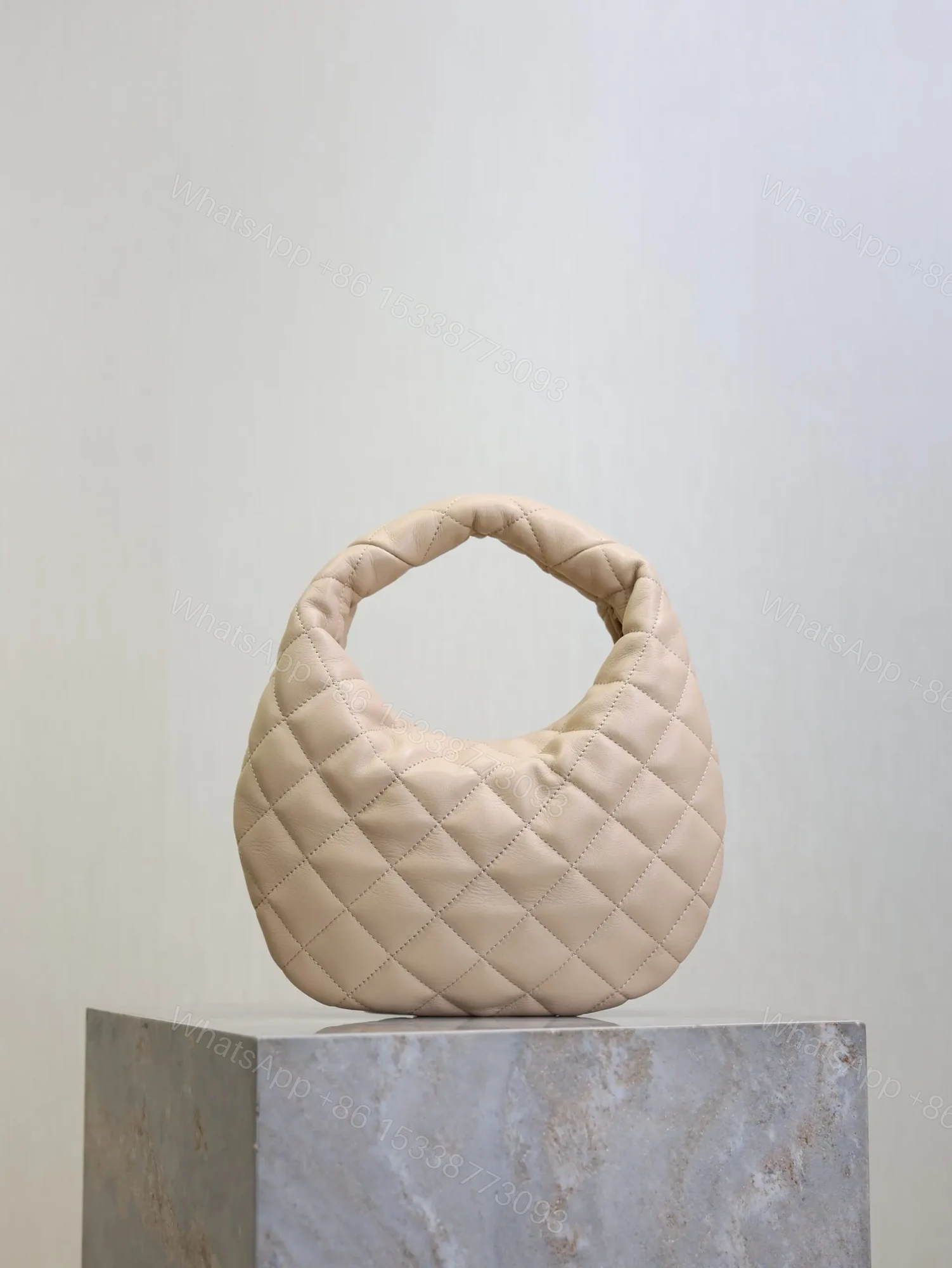 View 2 of YSL ICARINO 17 IN BEIGE QUILTED GOLD HARDWARE