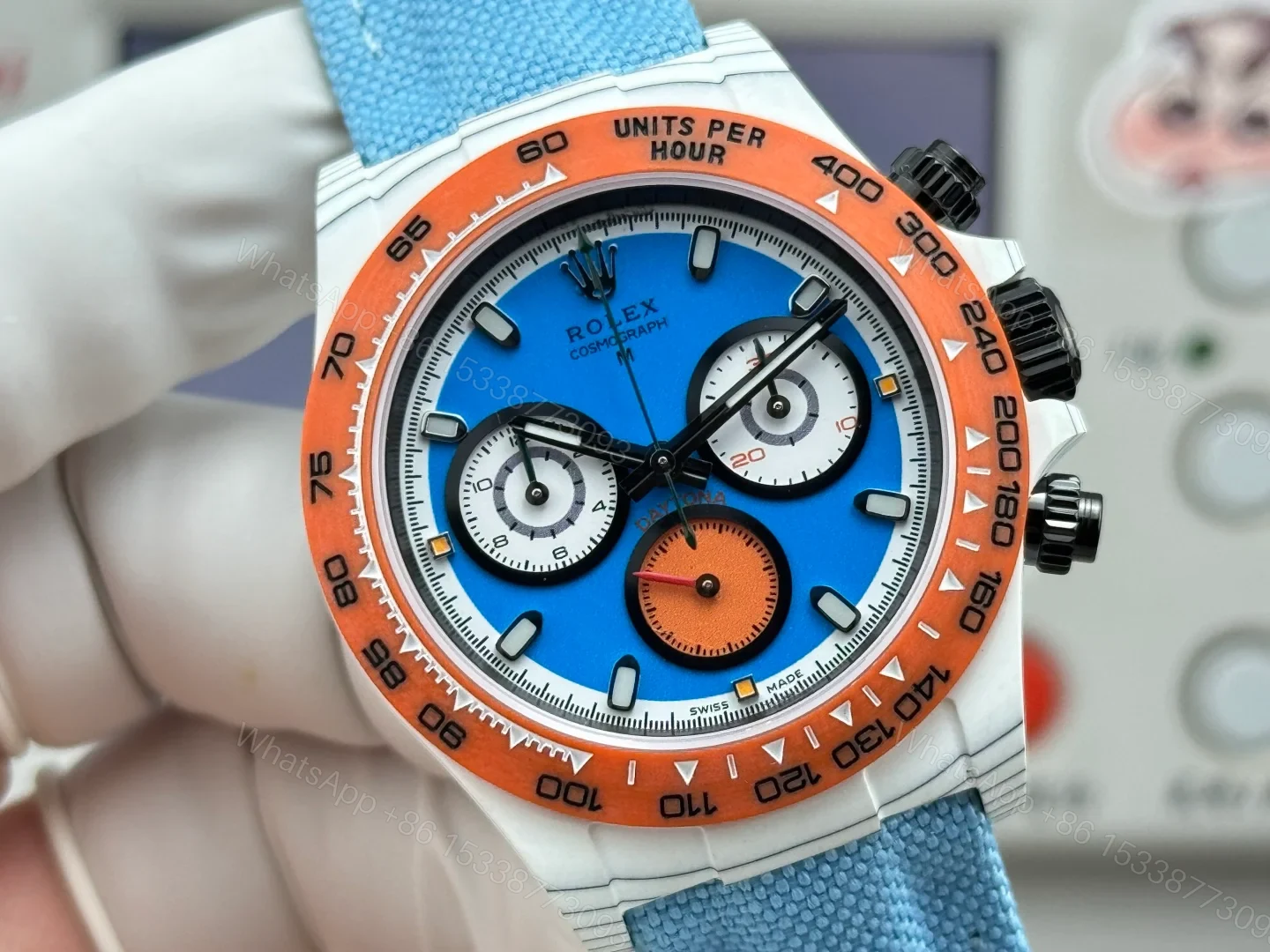 View 4 of Rolex Daytona Carbon Fiber Replica 40MM Exclusive Blue Dial Orange Bezel Fabric Strap R74 RG-ROLEX-DAYTONA