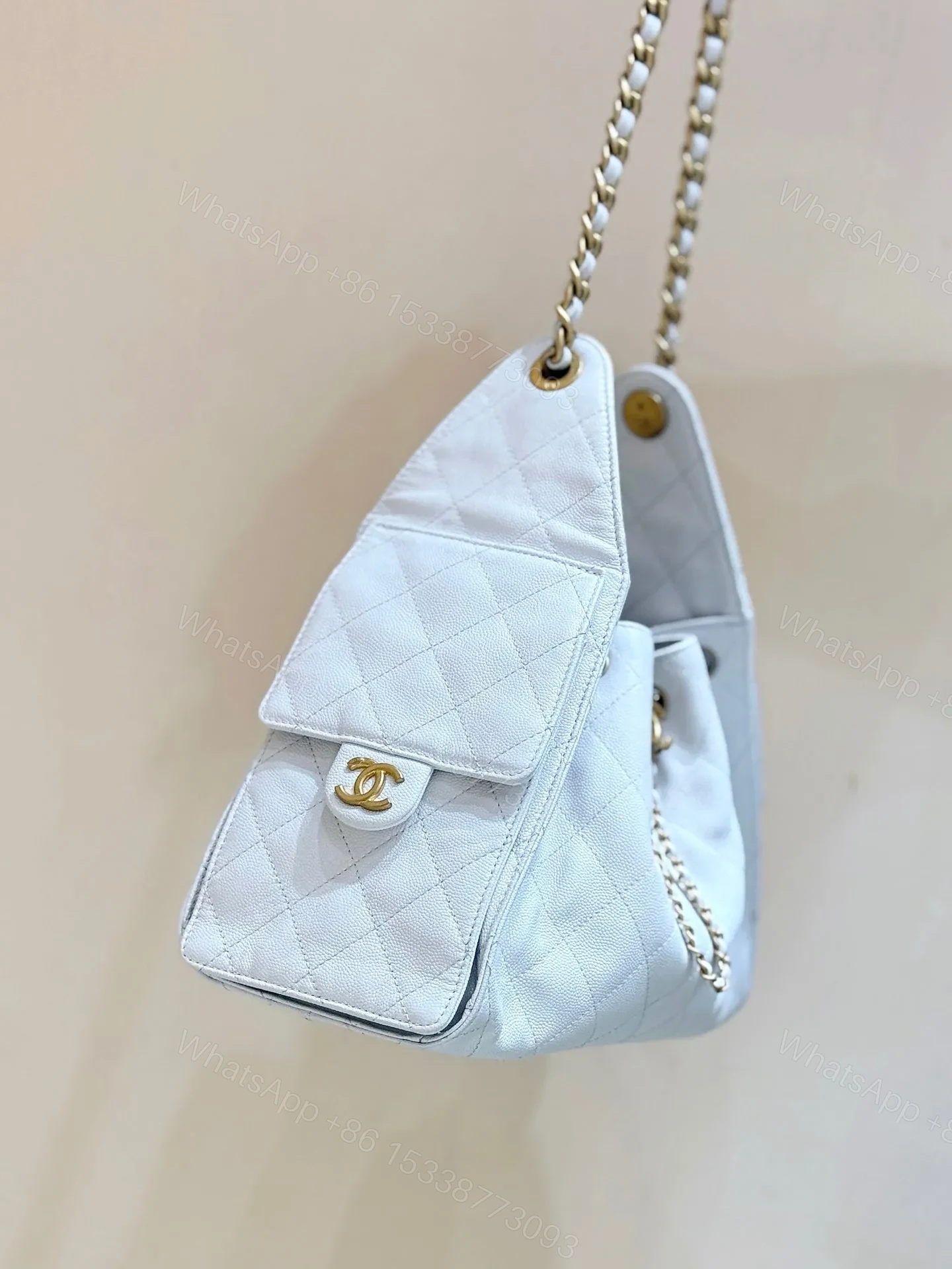 View 4 of CHANEL 25 HANDBAG IN WHITE 30 GOLD HARDWARE