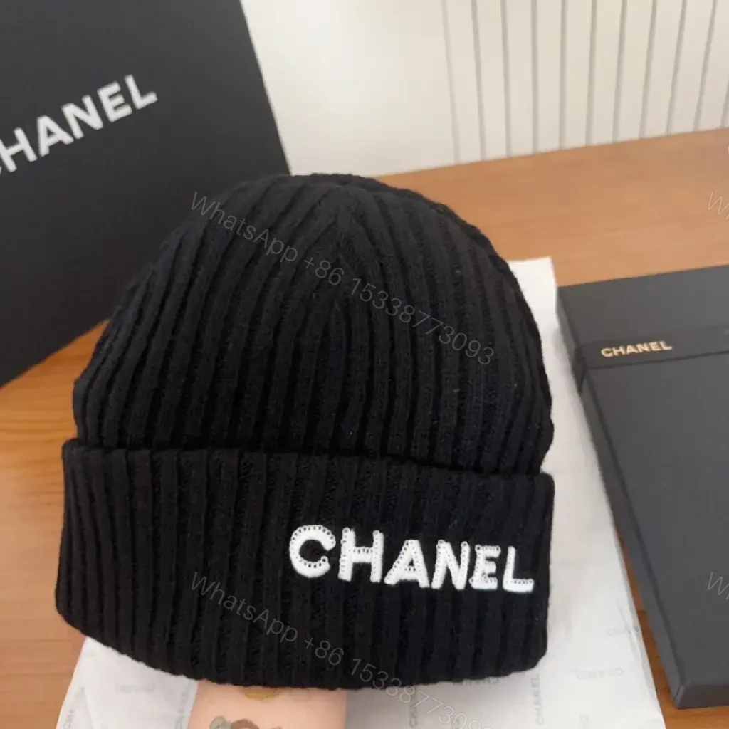 View 9 of Chic Rib Knit Beanie - Logo Cuff, Pure Warmth