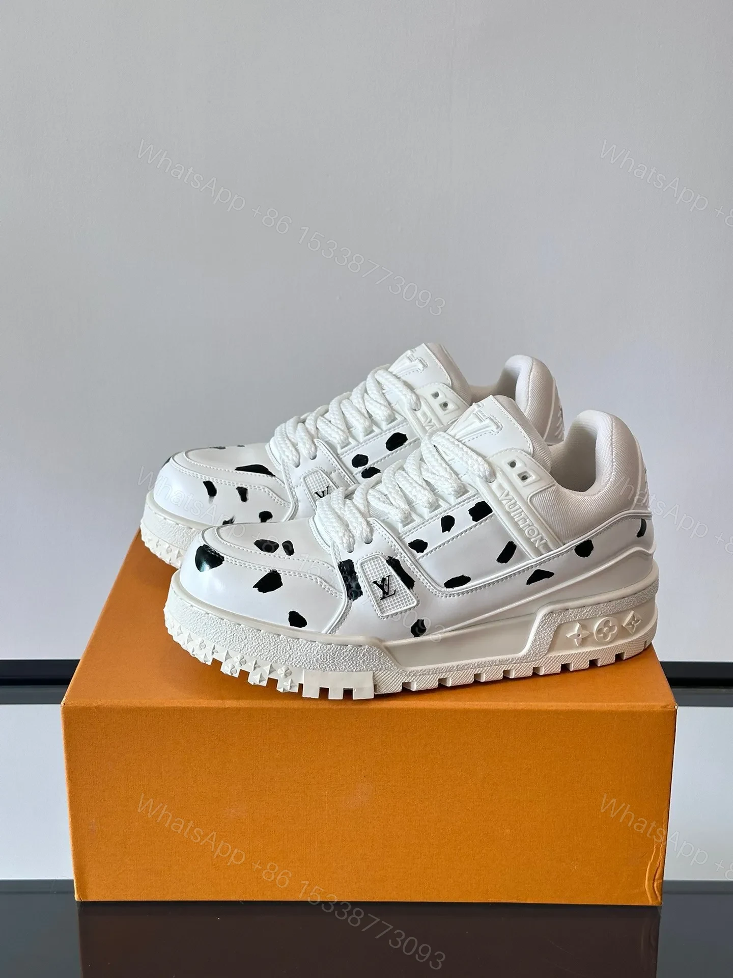 View 3 of LV Men White Leather Black Spot Sneakers