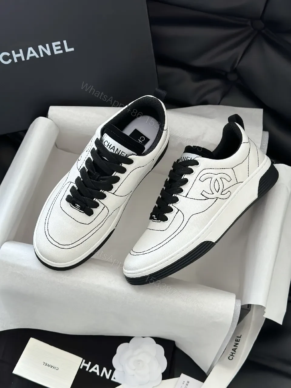 View 4 of Premium White Leather-like Low-Top Sneakers: Sleek, Comfortable, Versatile