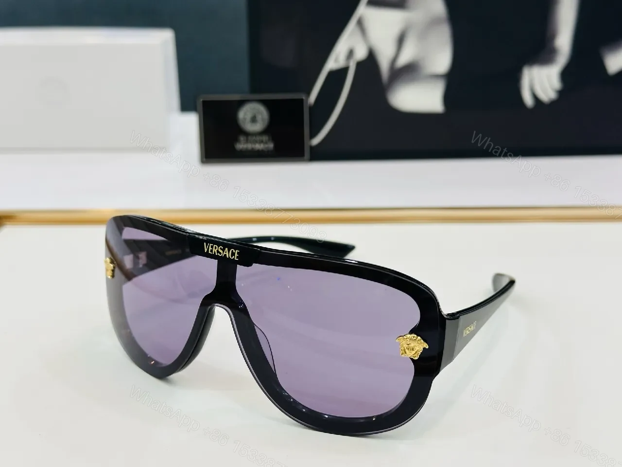 View 9 of Black Gloss Shield Sunglasses with Gold Emblems, Oversized Style