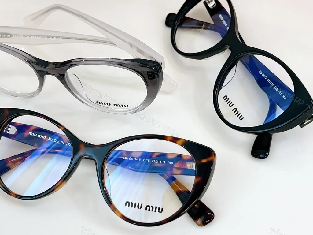 View 5 of Miu Miu Black Cat-Eye Eyewear: Everyday Luxury