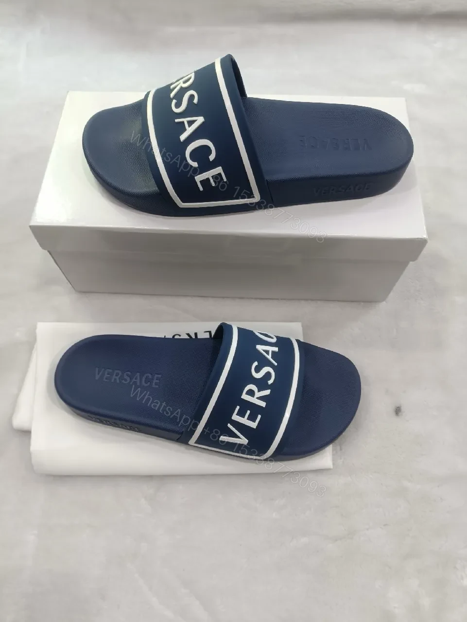 View 9 of Bold Navy Leather Slide: Luxe Logo Strap Comfort Slides