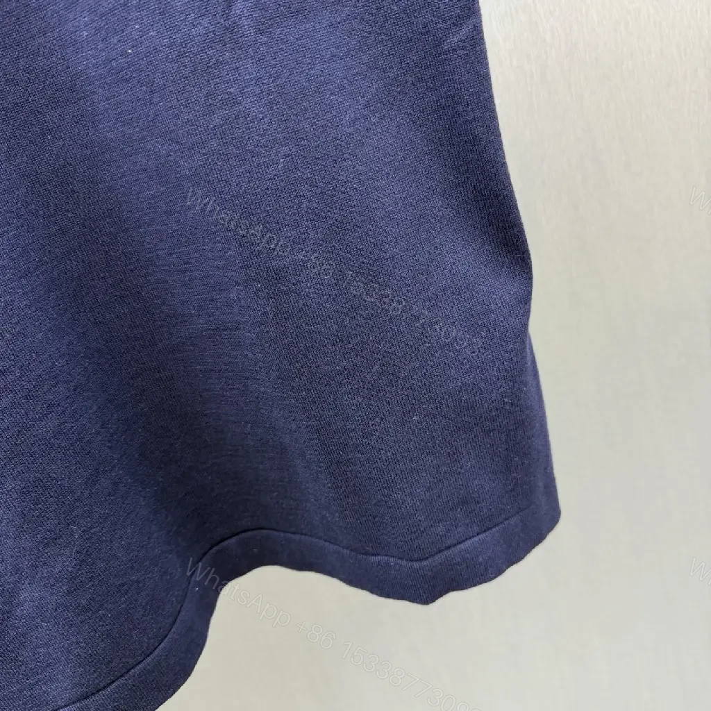 View 6 of Dark Navy Velvet-Lined Essential Tee with Gold Crest Emblem
