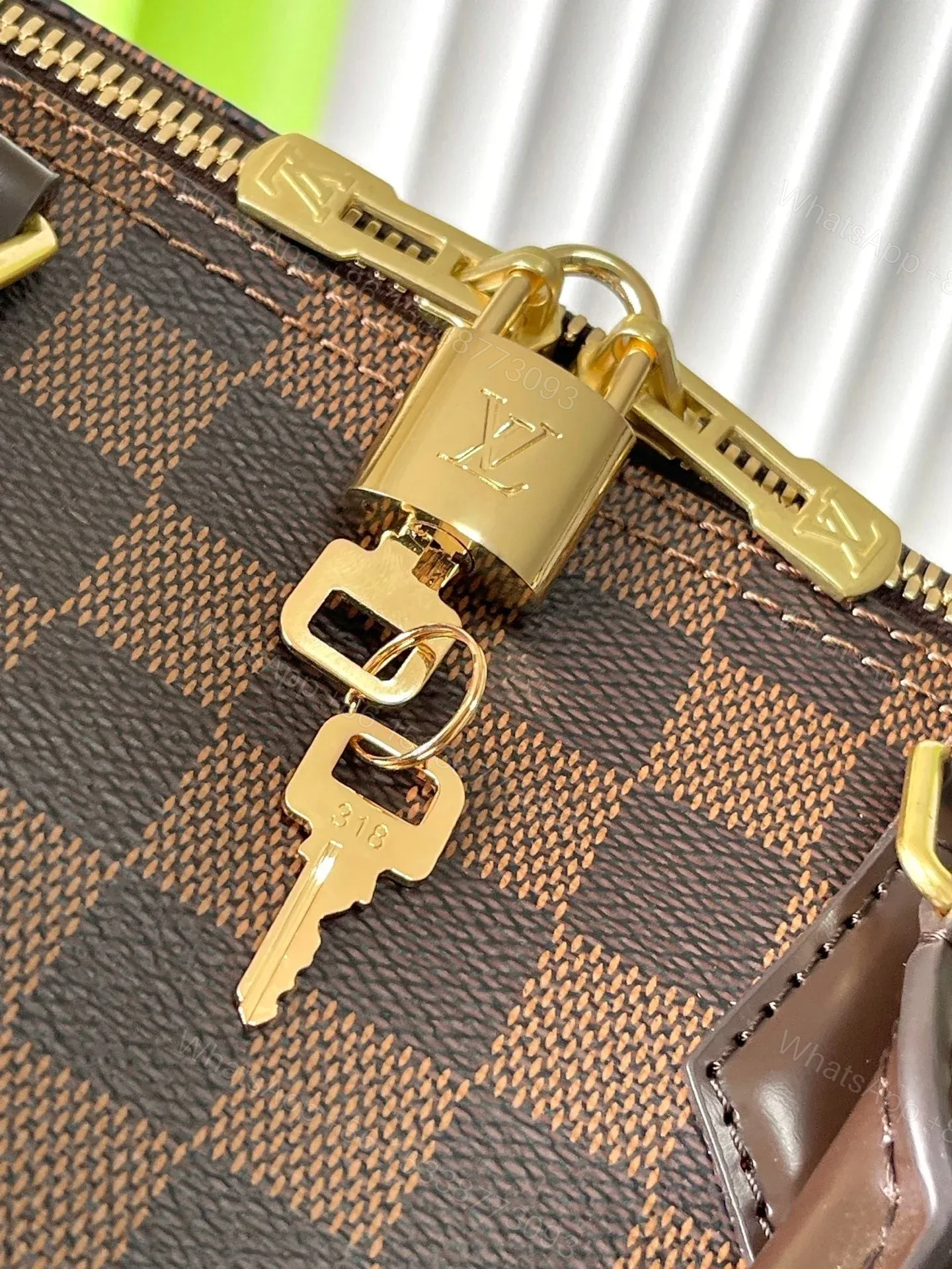 View 4 of LV SPEEDY BANDOLIÈRE 30 IN DARK BROWN DAMIER EBENE CANVAS GOLD LOCK