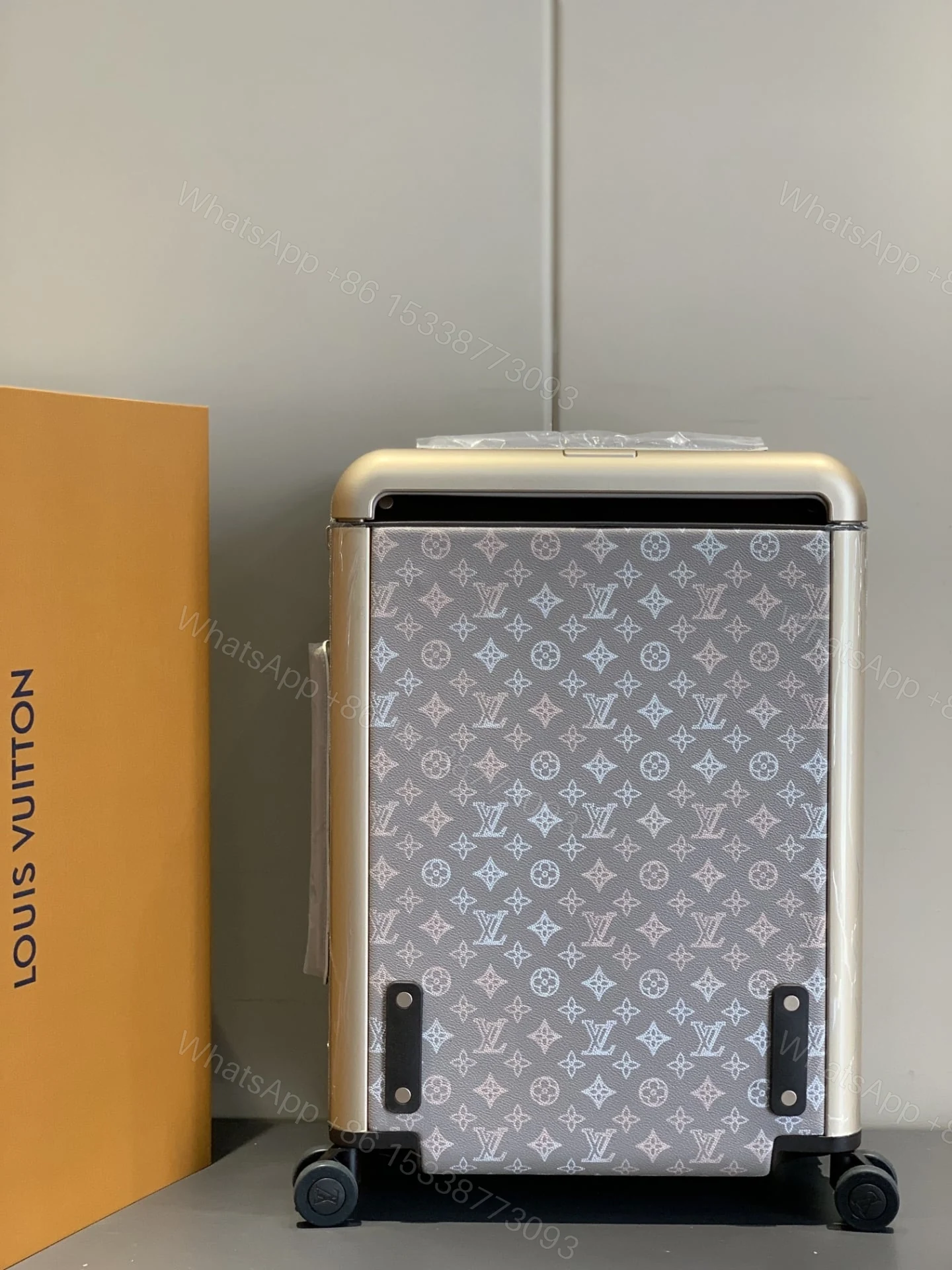 View 3 of Louis Vuitton Horizon 55 Suitcase Mahina Perforated Calfskin Leather Gray 55Cm M10282