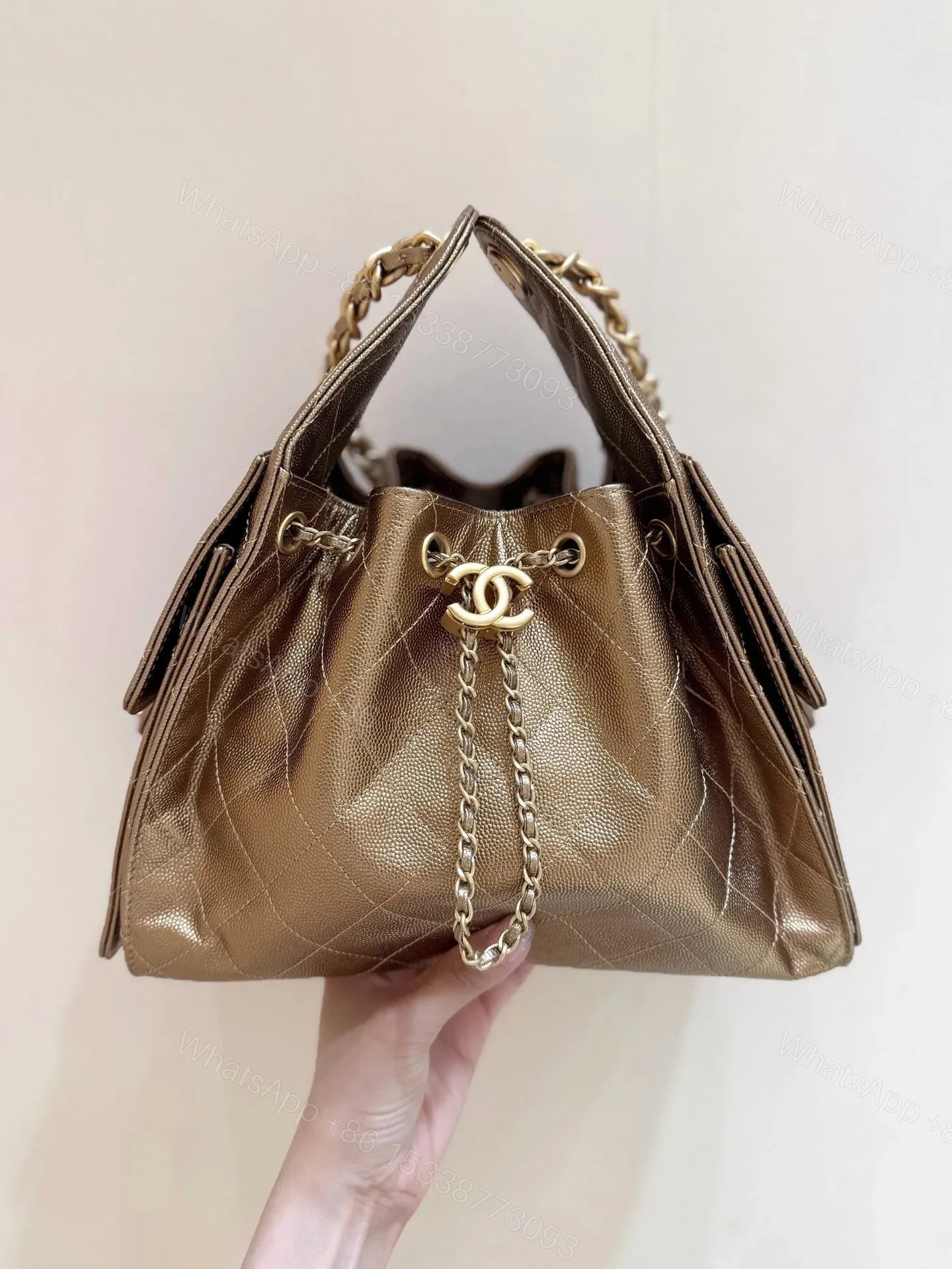 View 3 of CHANEL 25 HANDBAG 30 IN GOLDEN BROWN WITH GOLD HARDWARE