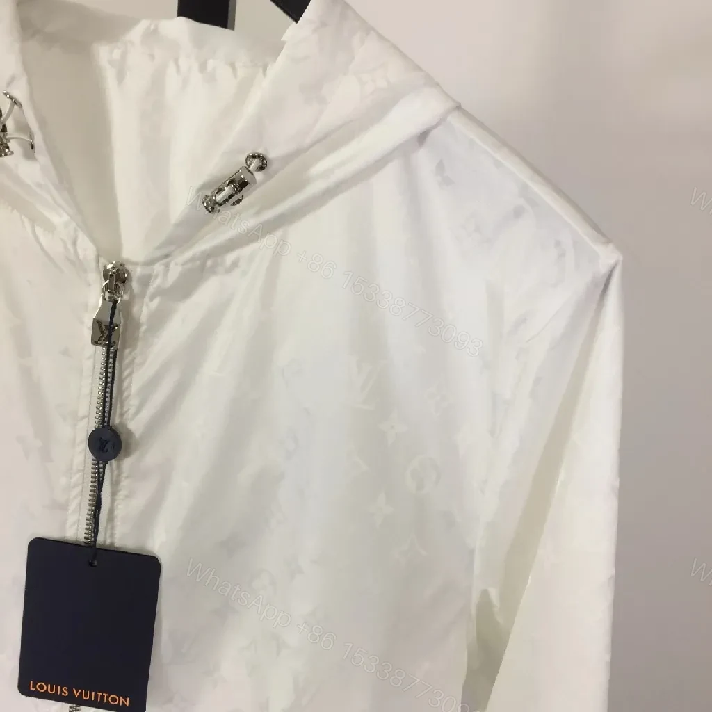 View 3 of White Zip-Front Jacket with Subtle Monogram Texture