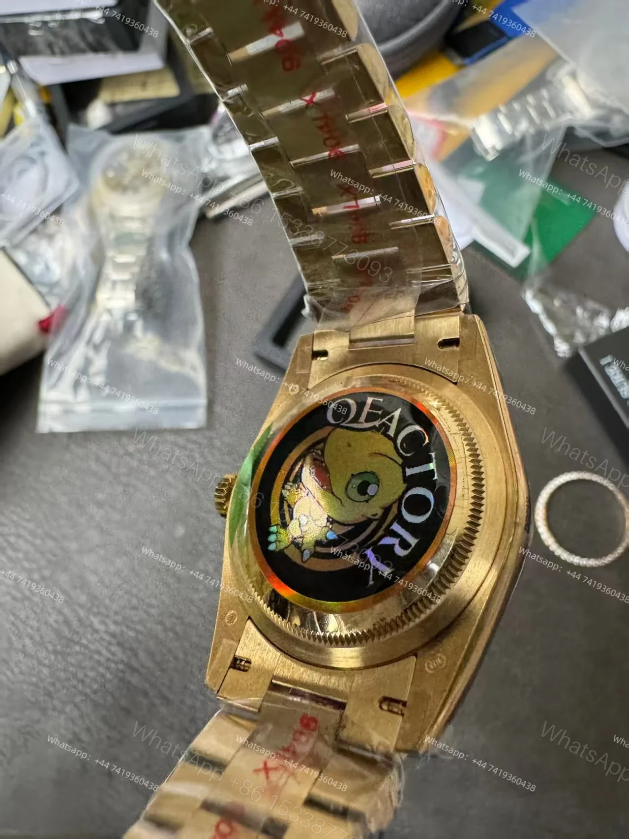 View 15 of Rolex Day-Date M228348RBR-0002 1:1 Replica Moissanite Bezel Gold Dial 40MM 3255 Movement Super Clone Watch