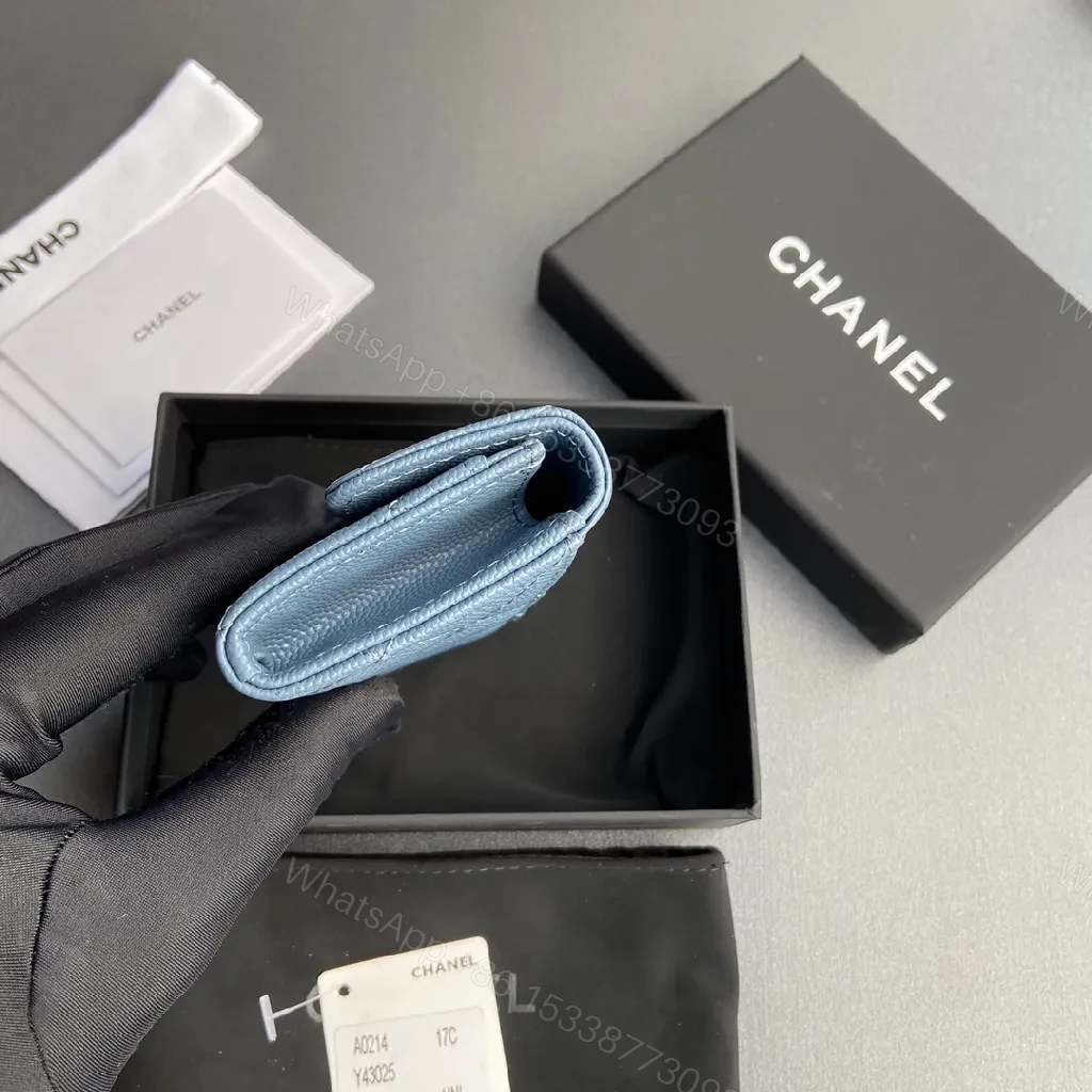 View 9 of Powder Blue Quilted Lambskin Wallet: Compact, Day-to-Night Chic