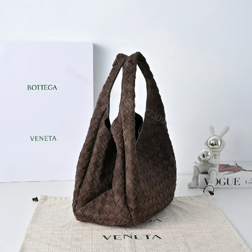 View 10 of brown woven leather hobo bag with intrecciato texture for everyday luxury