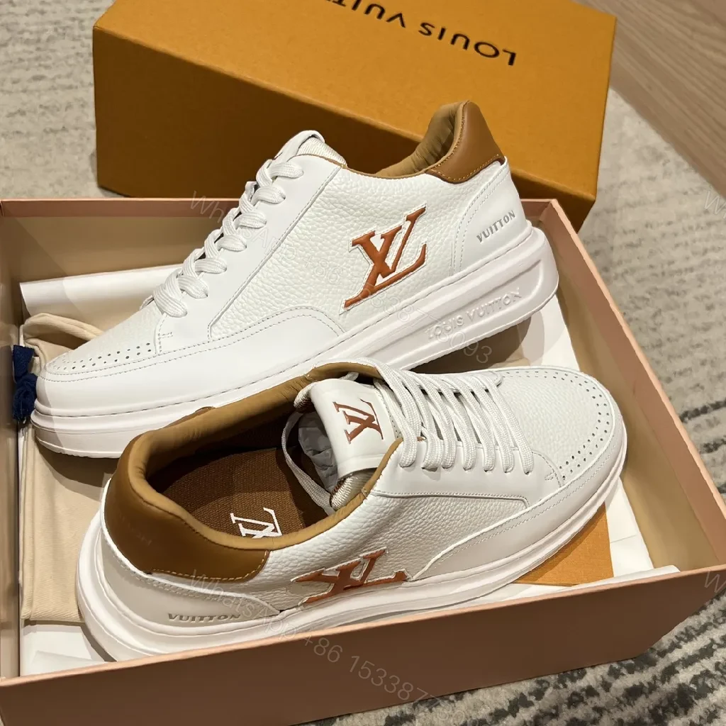 View 8 of White Leather Low-Top Sneakers - Contrasting Tan Accents & LV-Inspired Details