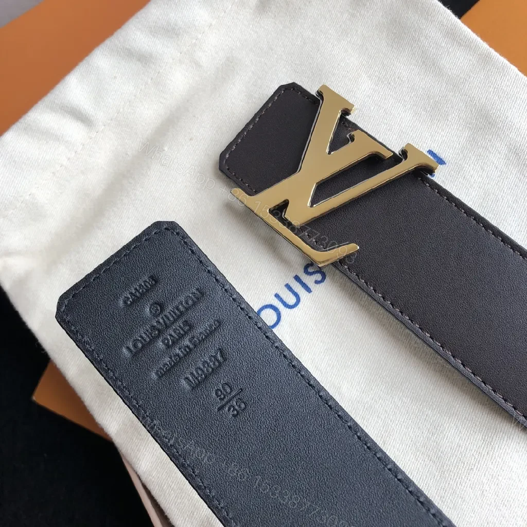 View 2 of Refined Black Leather Belt with Gold Buckle, Medium Width